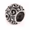 Bartperle und Lockenperle mit Spiralen aus Silber