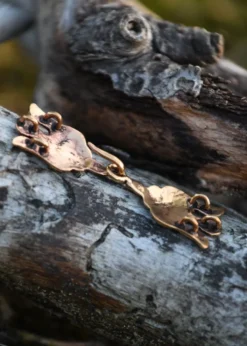 Gewandschließe aus Bronze, Hugin & Munin