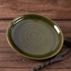 Hochmittelalterlicher Essteller aus Ton, grün, 22 cm
