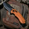 Taschenmesser Kiku XR LTE - Orangenes G10 + Karbon, SOG