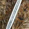 Webschiffchen aus Knochen mit Streifenmuster