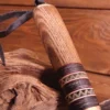 Wikinger-Messer aus Damaststahl, Holzgriff mit Knochenbesatz, leichte Mängel